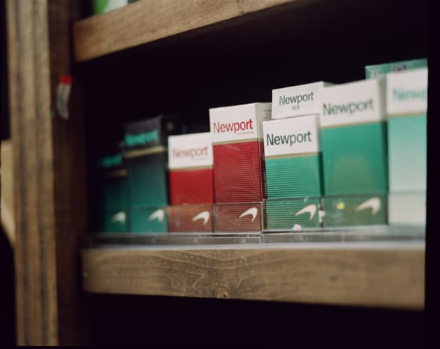 Packets of Newport menthol cigarettes on a store shelf