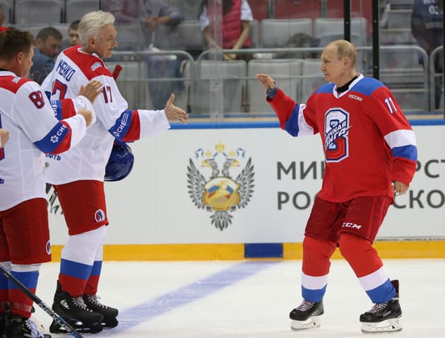 Gennady Timchenko plays ice hockey with Vladimir Putin