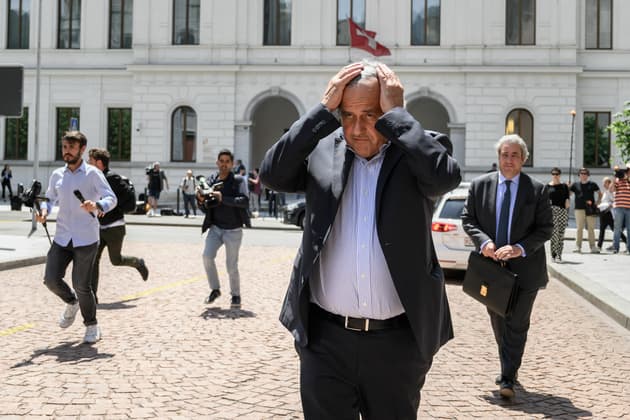Michel Platini leaves a Swiss court after the first day of his fraud trial in June