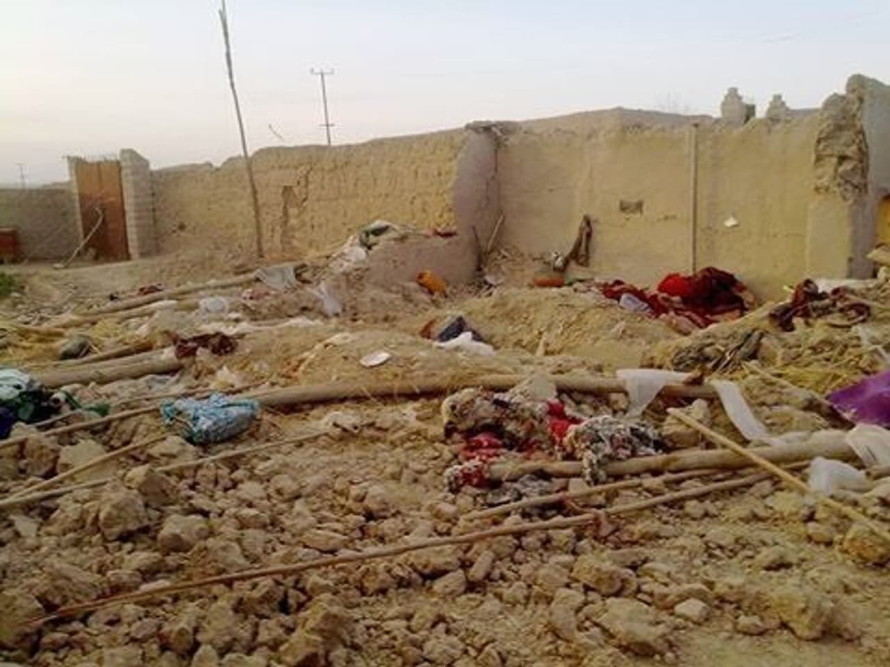 An image of one of the three air strikes, with damaged houses