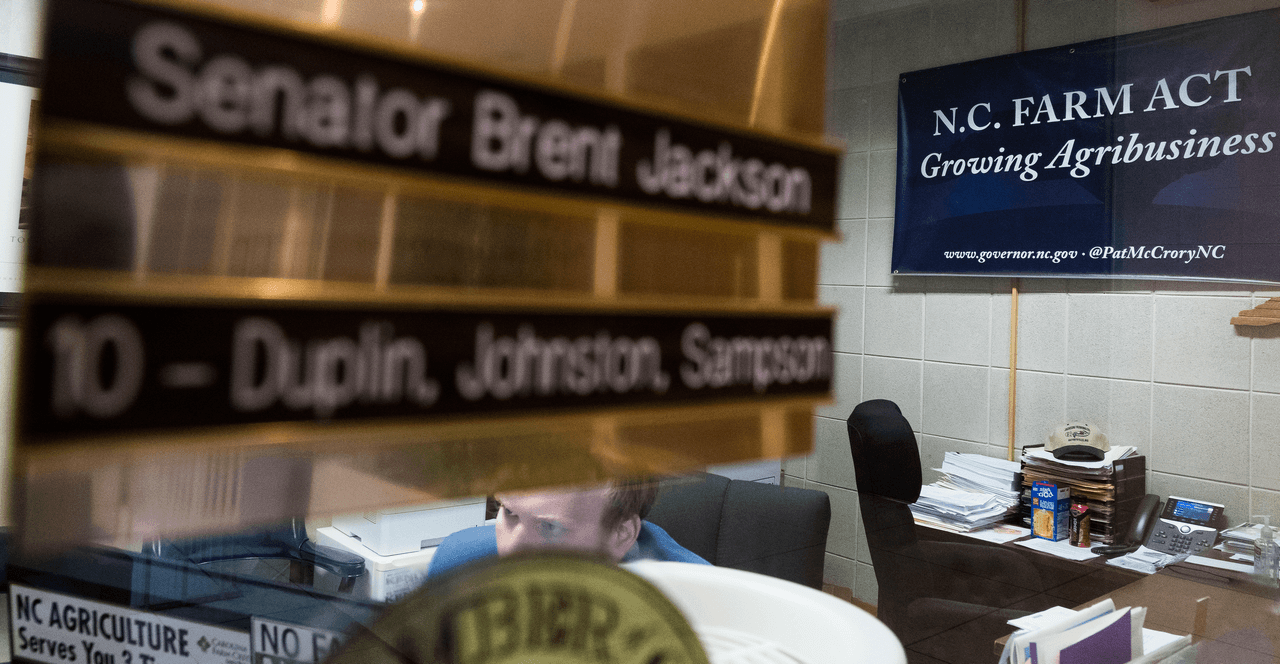 A sign bearing Brent Jackson's name in a political office