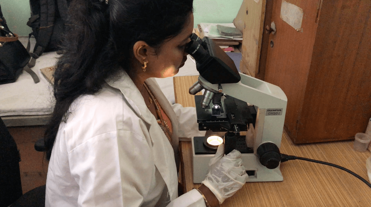 Diagnosing TB through examining sputum under a microscope