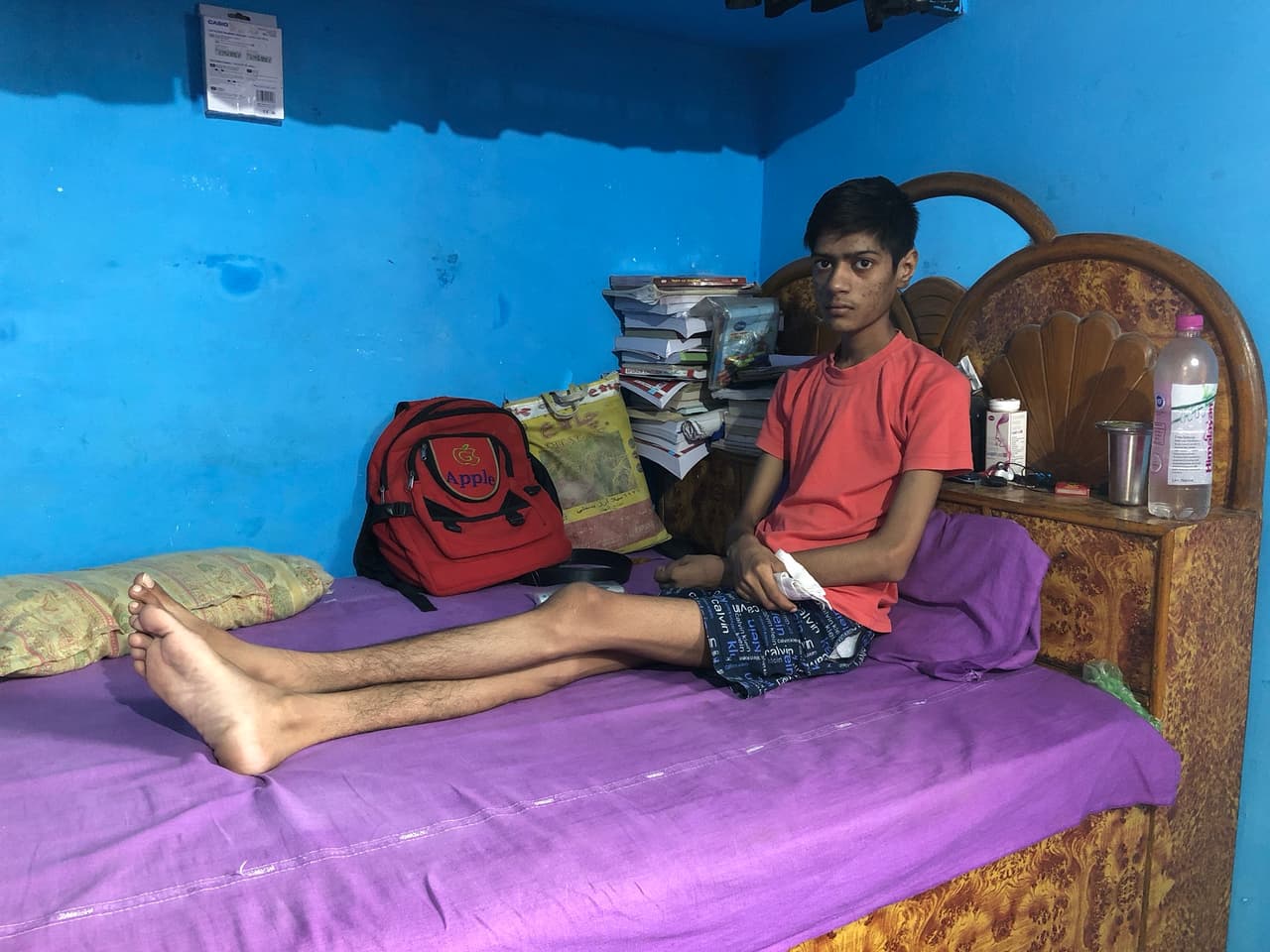 A teenager with drug resistant TB spends most of his time inside his home